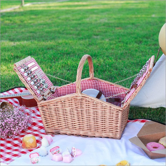 Luxury women's picnic basket set, perfect for outdoor dining, with integrated crockery & cooler.