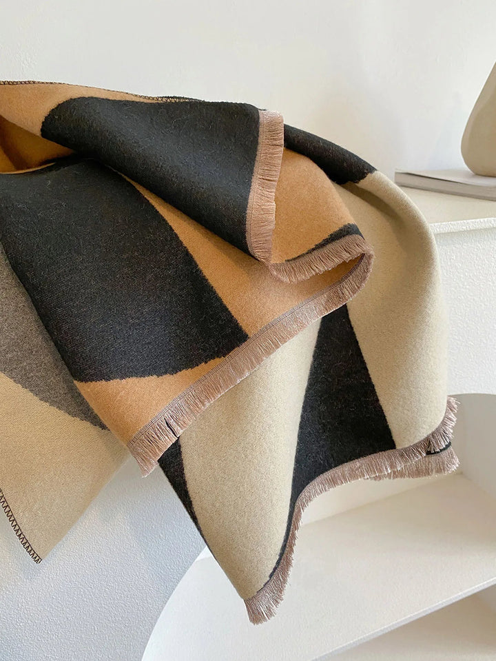 Beautifully soft and warm women's reversible scarf in elegant lilac and black.