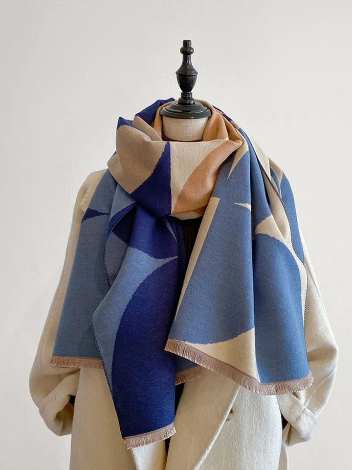 Cozy winter accessory: a stylish reversible lilac and black scarf for women.