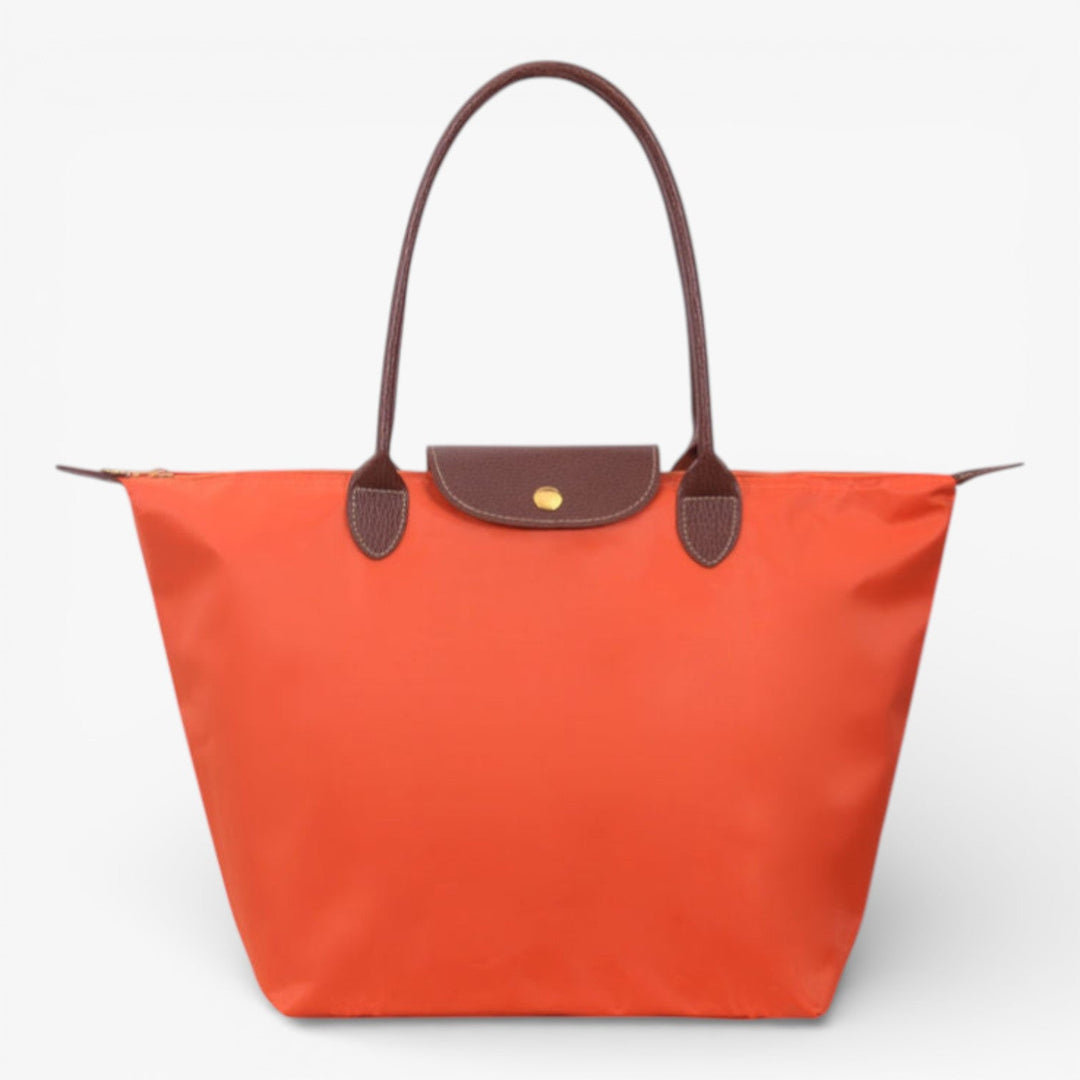 Luxury women's travel shoulder bag, spacious and secure with a reliable zip closure.
