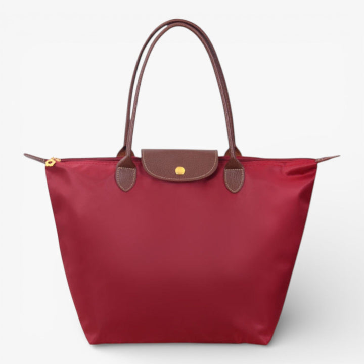 Elegant women's luxury shoulder bag, a sophisticated accessory with a secure zipper for modern women.