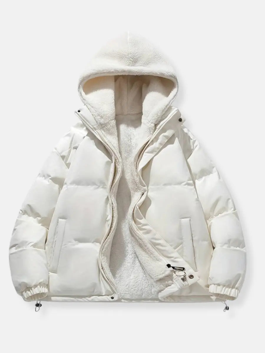 Women's designer puffer jacket, hooded and warm for sophisticated winter outerwear.