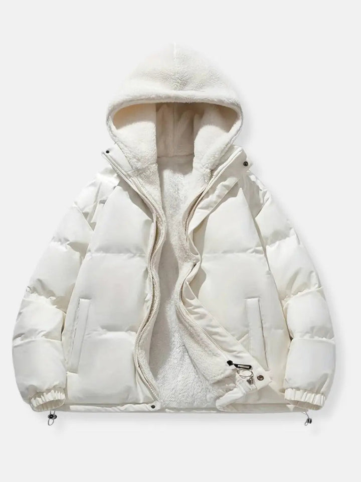 Women's designer puffer jacket, hooded and warm for sophisticated winter outerwear.