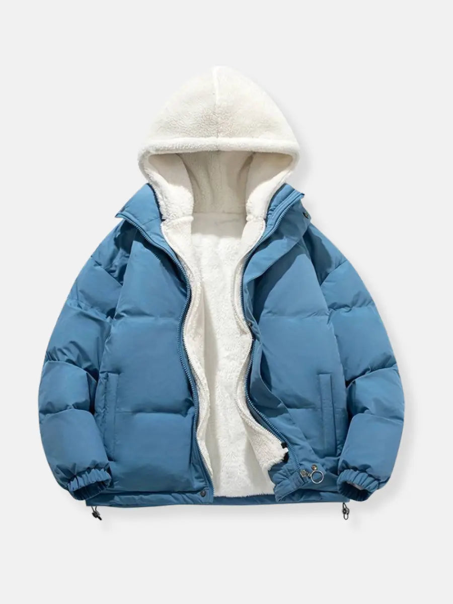 Modern women's padded jacket, sleek hooded design for urban winter fashion.