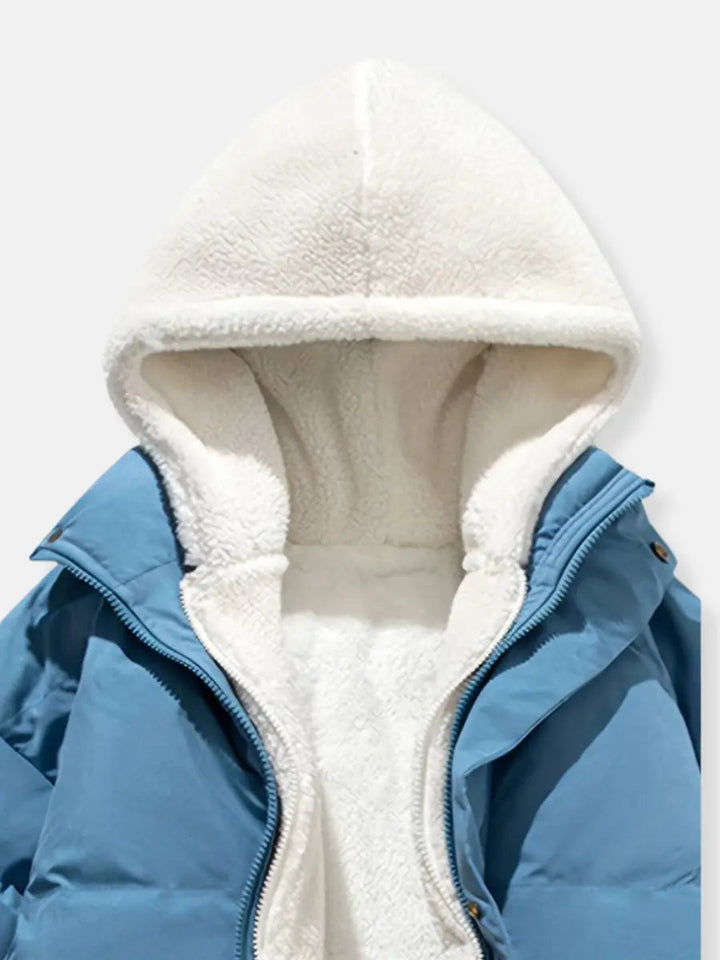 Chic women's winter puffer jacket, offering warmth and style for cold days.
