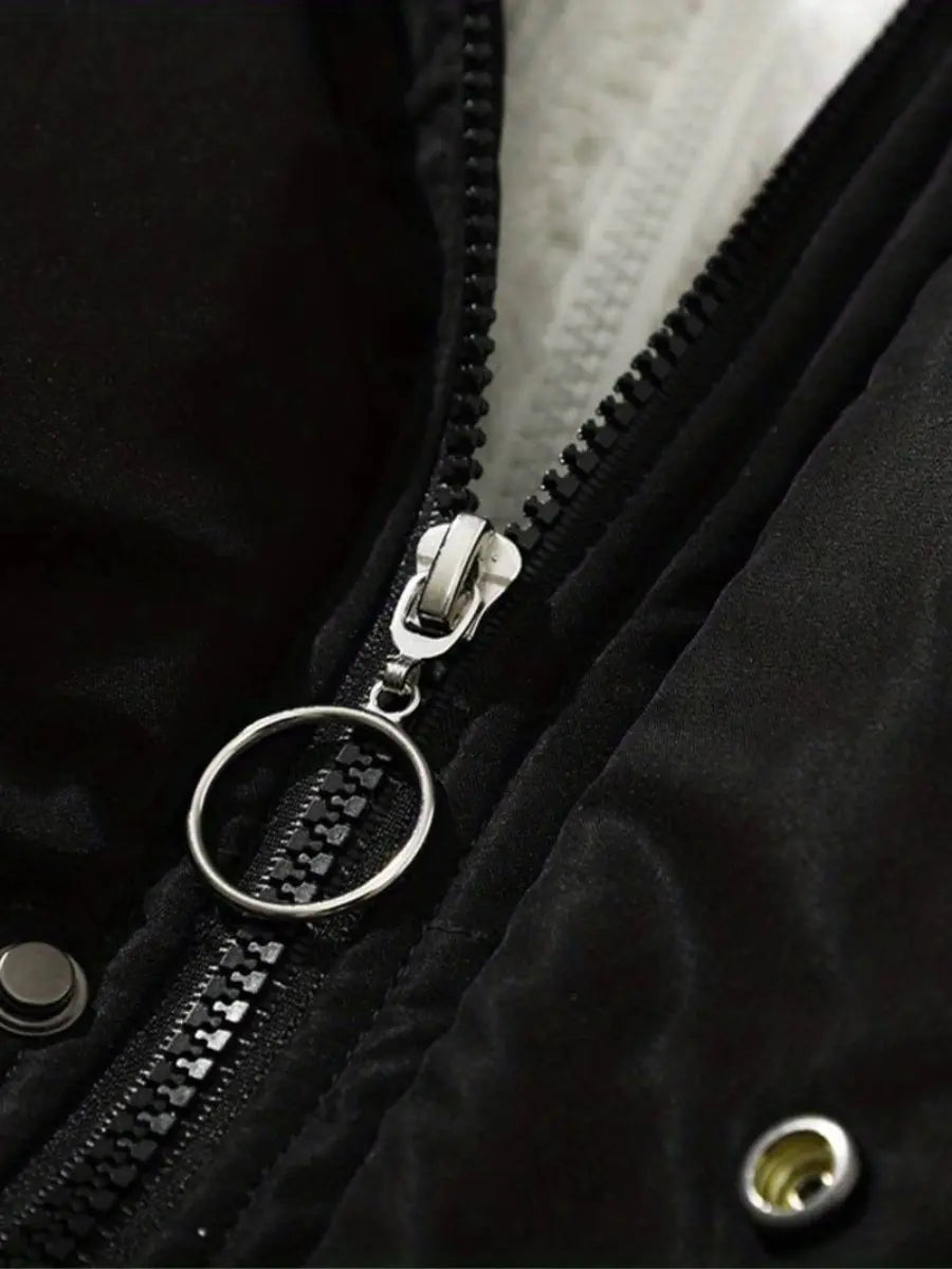 Stylish women's padded winter jacket, sleek design for cold weather outdoor adventures.