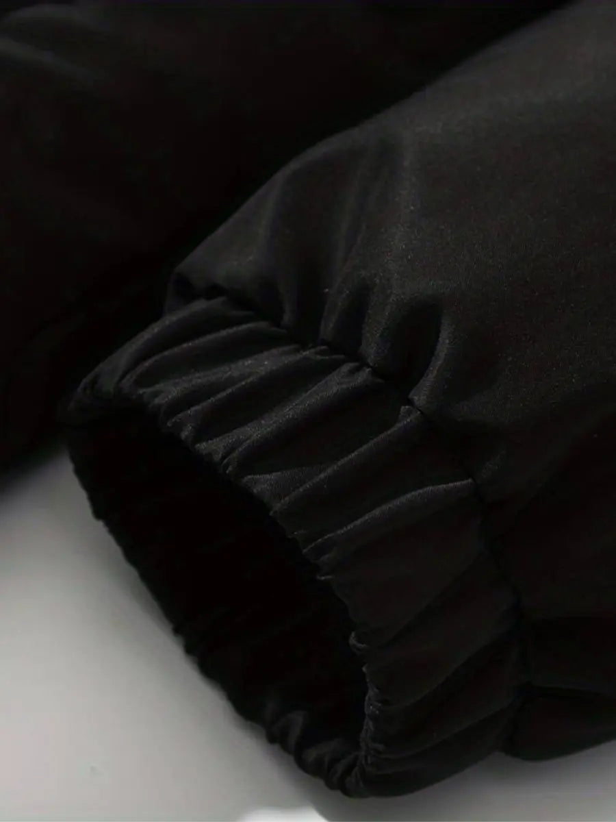 Cozy women's puffer jacket with hood, essential warm outerwear for winter seasons.
