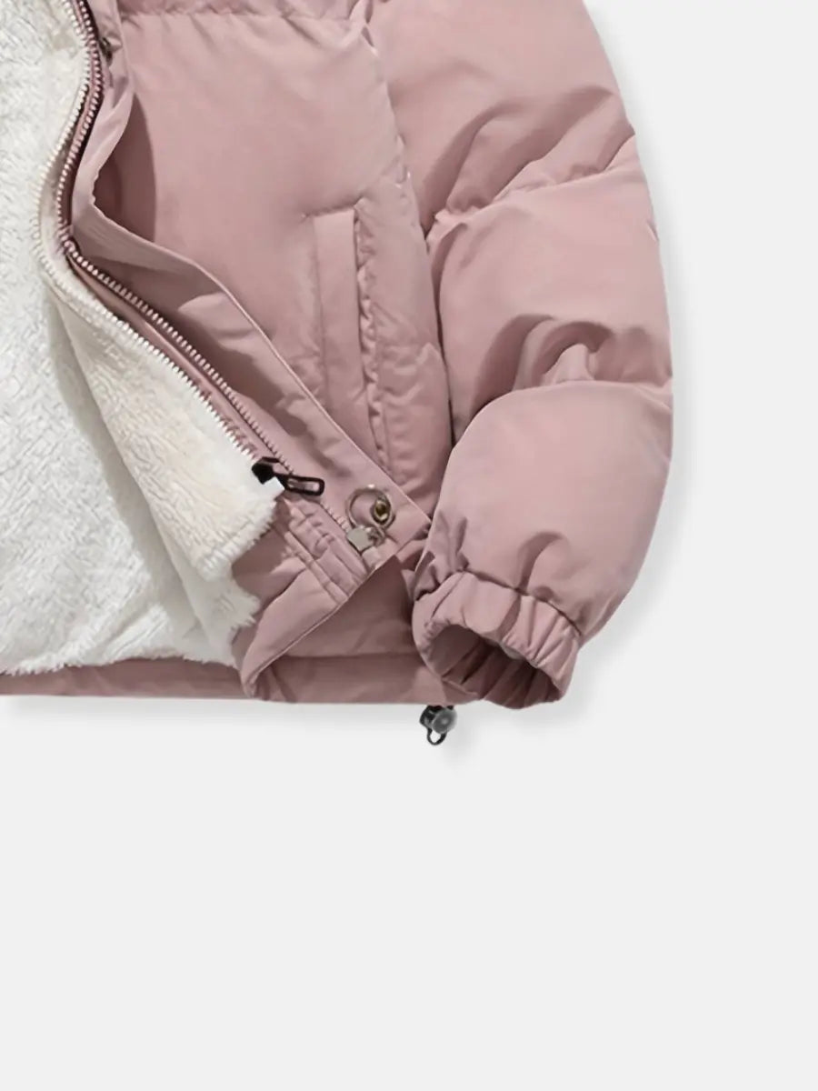 Padded women's winter coat, cozy and stylish hooded jacket for cold weather fashion.
