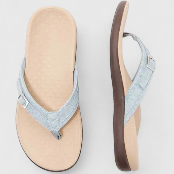 Pair of women's Maine orthopedic beach sandals, offering comfortable footwear & arch support for summer adventures.