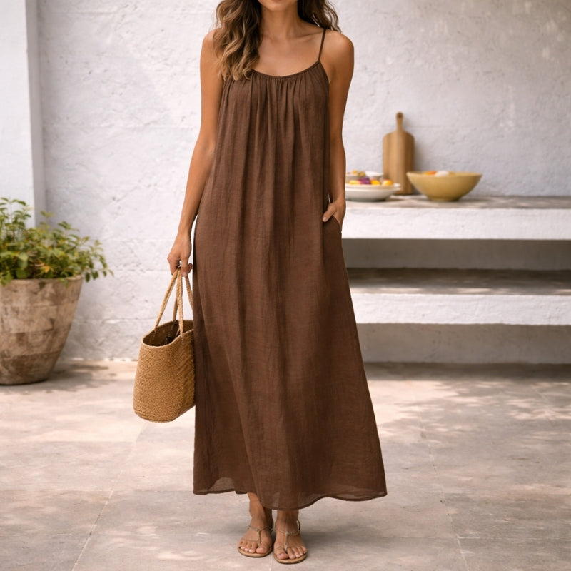 Women's maxi sundress with spaghetti straps, perfect for summer fashion.