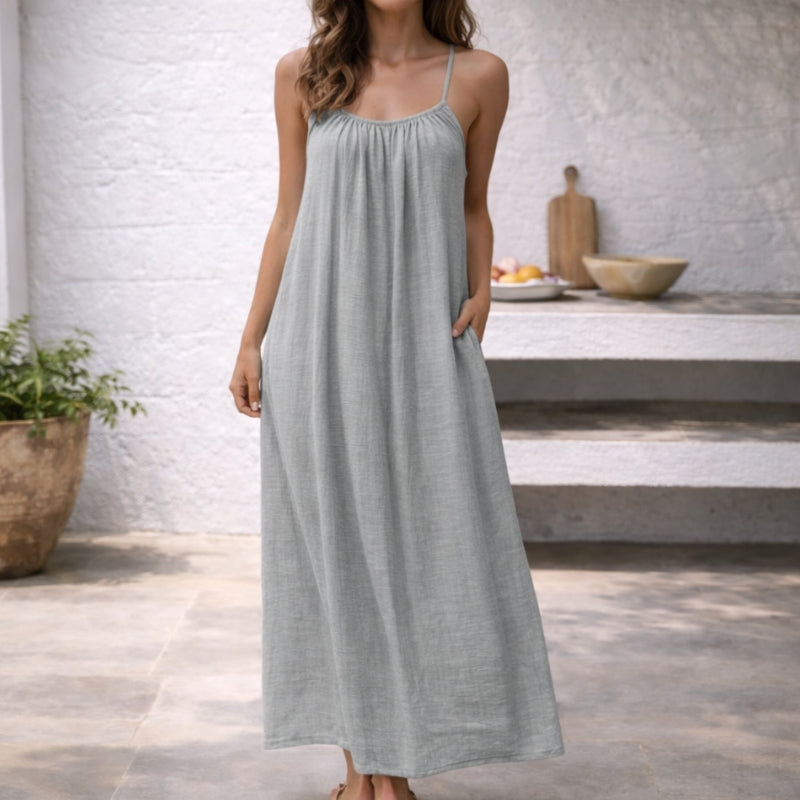 Beach-ready women's maxi sundress, spaghetti strap vacation essential.