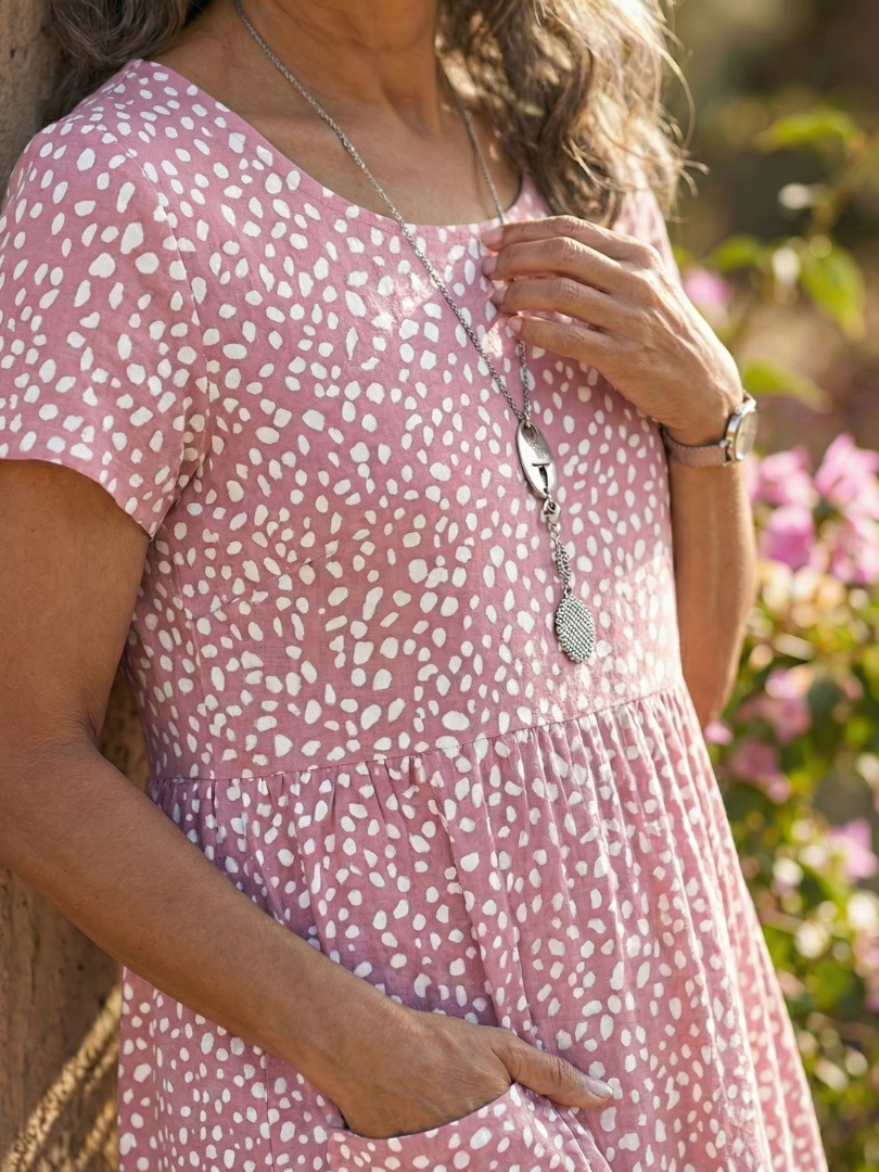 Soft, comfortable women's dotted casual dress with a relaxed fit, short sleeve, knee length for summer.