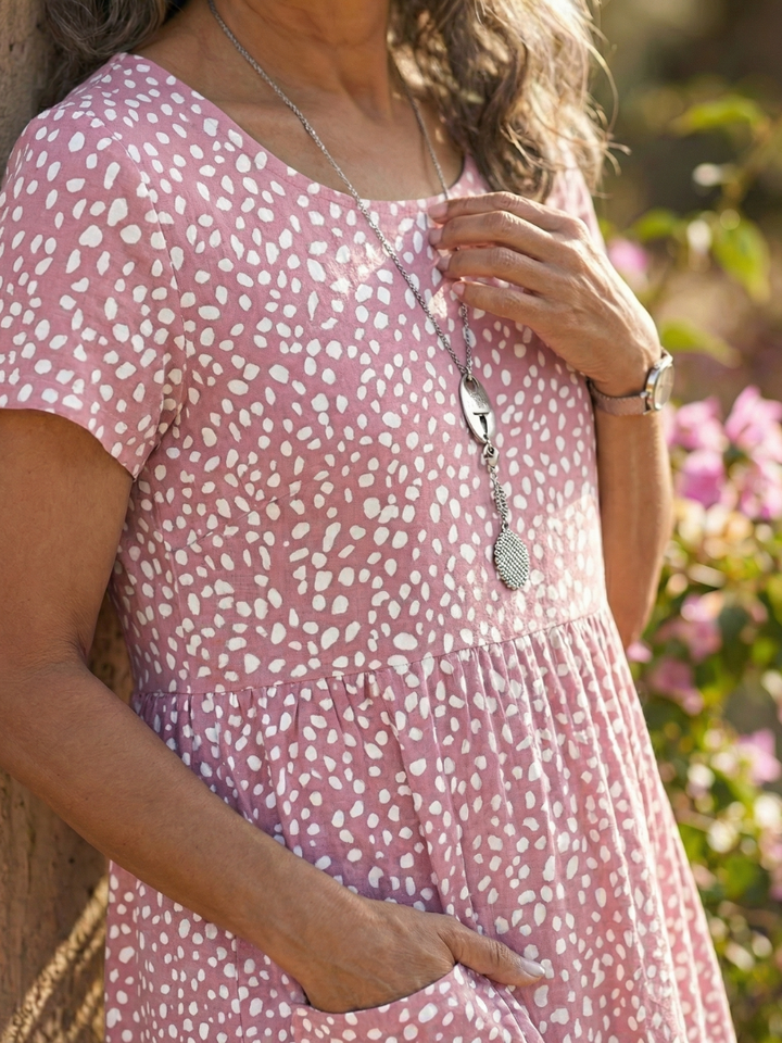 Soft, comfortable women's dotted casual dress with a relaxed fit, short sleeve, knee length for summer.