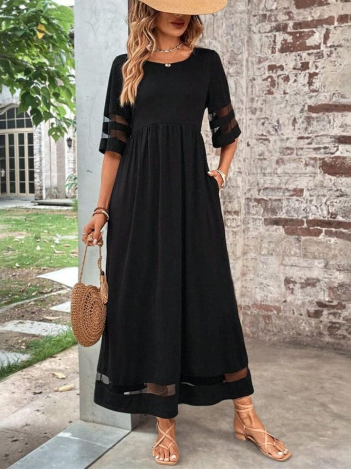 Women's mesh panel midi dress with elegant half sleeves. Perfect for summer, evening, or holiday fashion.