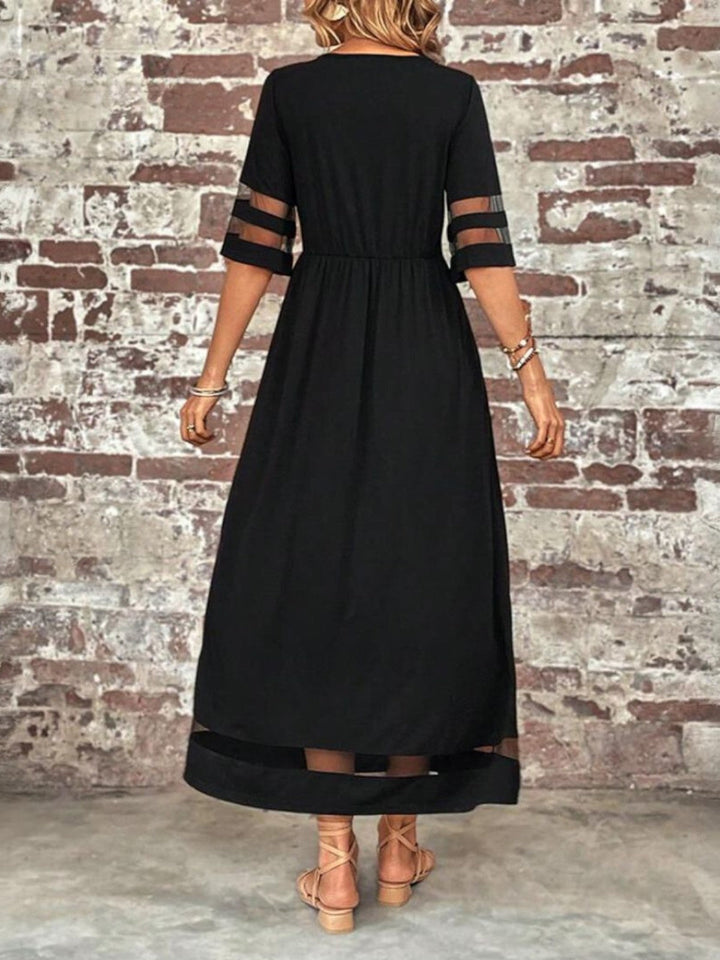 Flattering women's midi dress featuring stylish mesh panels & half sleeves. Versatile for casual or evening wear.