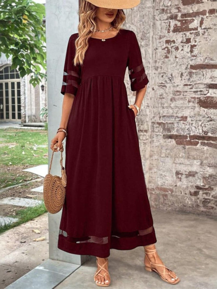 Chic women's mesh panel midi dress with half sleeves, ideal as a casual, summer, or holiday dress.