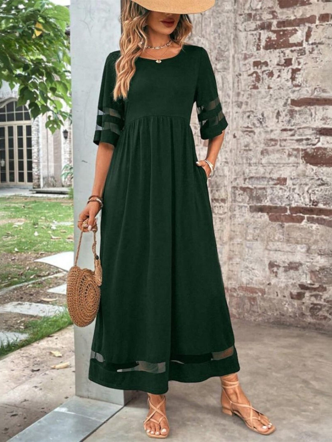 Stylish women's midi dress featuring unique mesh panels & comfortable half sleeves for a flattering fit.