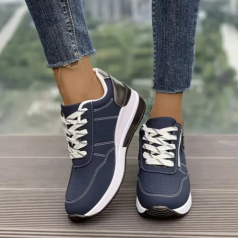Stylish women's Messa trainers with elevated sole, offering orthopaedic comfort & arch support for fashion & daily wear.