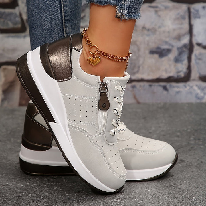 Close-up of Messa women's comfort shoes. Orthopaedic trainers with elevated sole, arch support, perfect for walking.