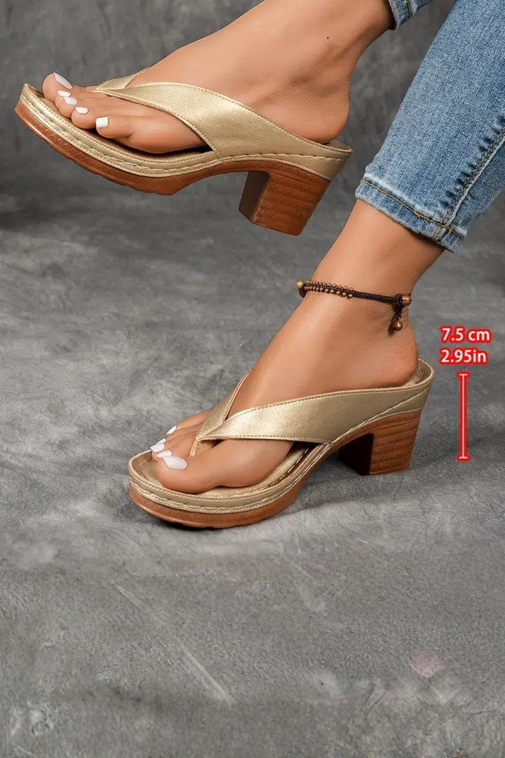 Chic metallic toe post flip flop sandals for women, designed with a trendy block heel.