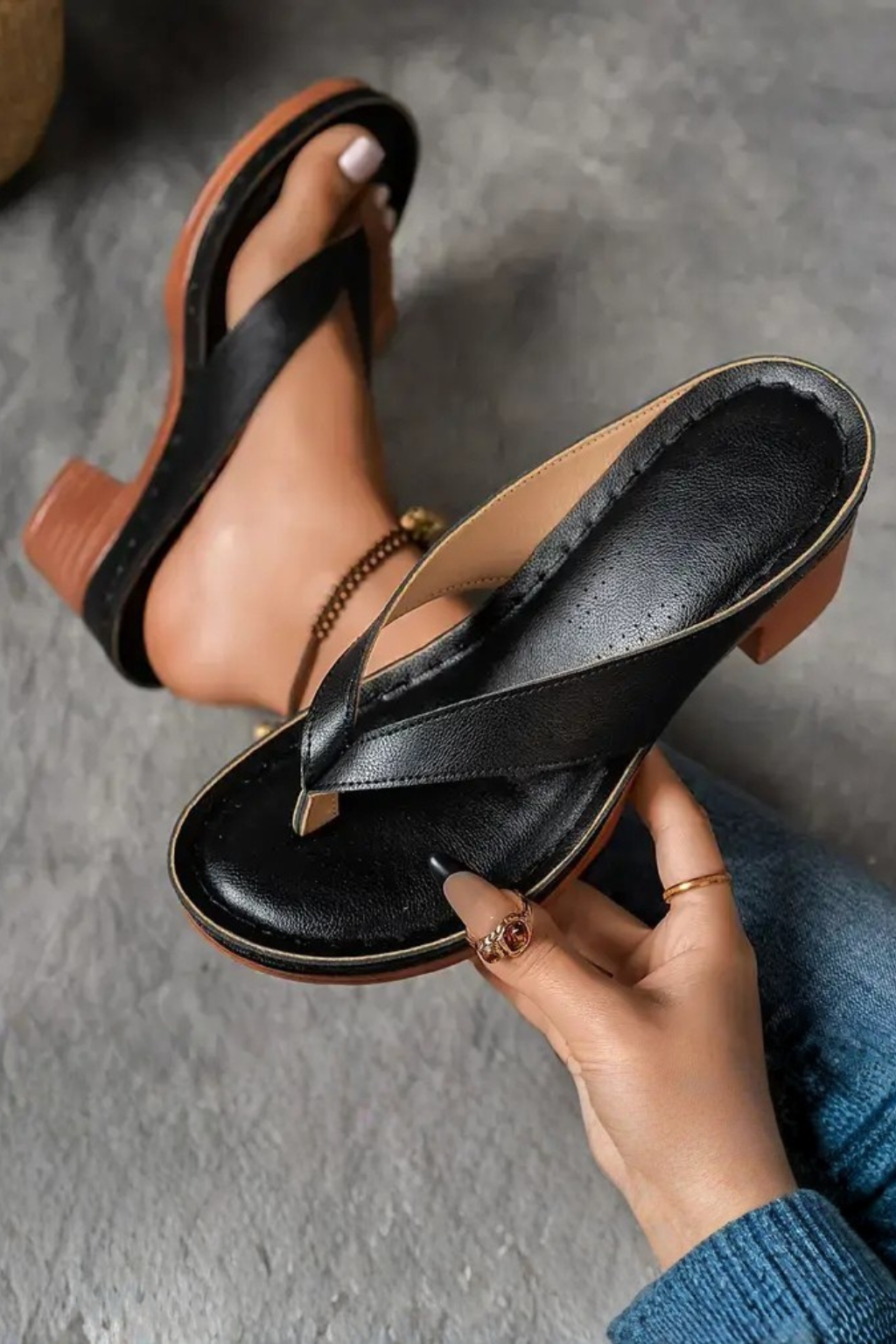 Sophisticated women's metallic toe post footwear, a block heel sandal for elegant wear.