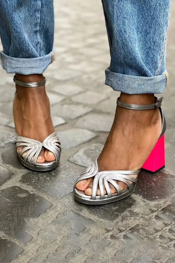 Elegant women's metallic strappy sandals with a comfy block heel. Two-tone design, perfect for stylish summer fashion.