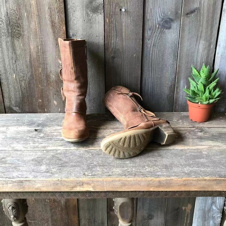 Stylish women's mid-calf brown boots featuring a practical side zip & sturdy block heel for winter.