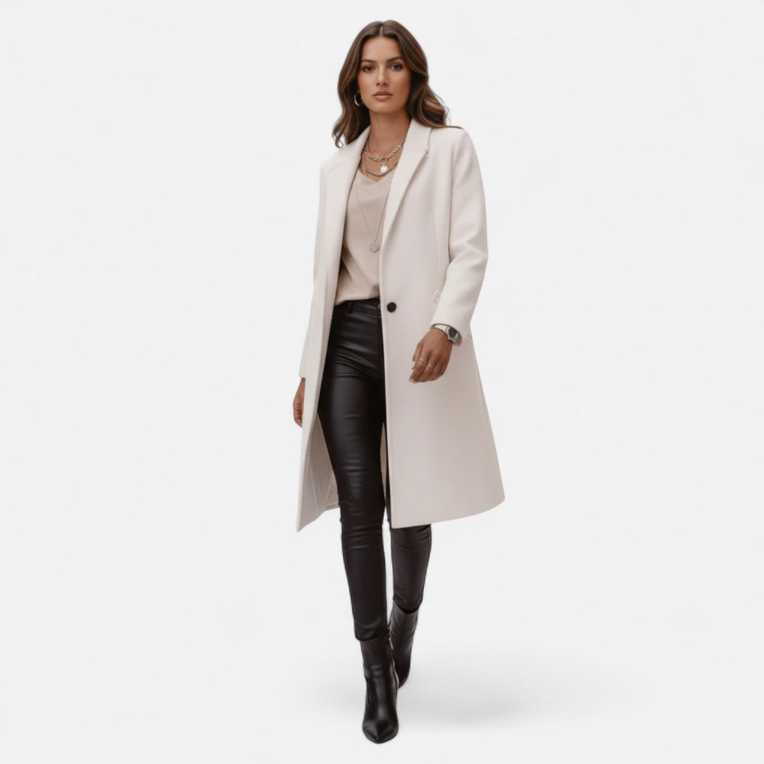 Chic women's tailored coat, mid-length, wool blend, featuring solid lapels for a classic look.