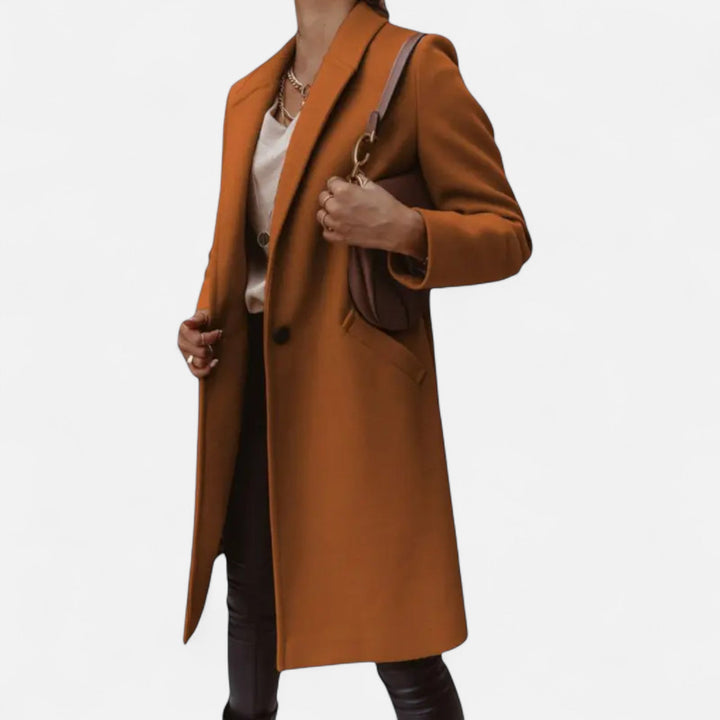 Elegant women's winter fashion: a mid-length wool blend coat with sophisticated solid lapels.