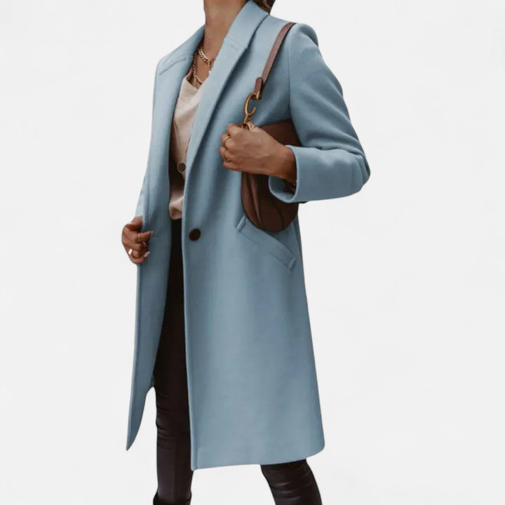 A sophisticated women's solid color coat, mid-length, wool blend, perfect for layering.
