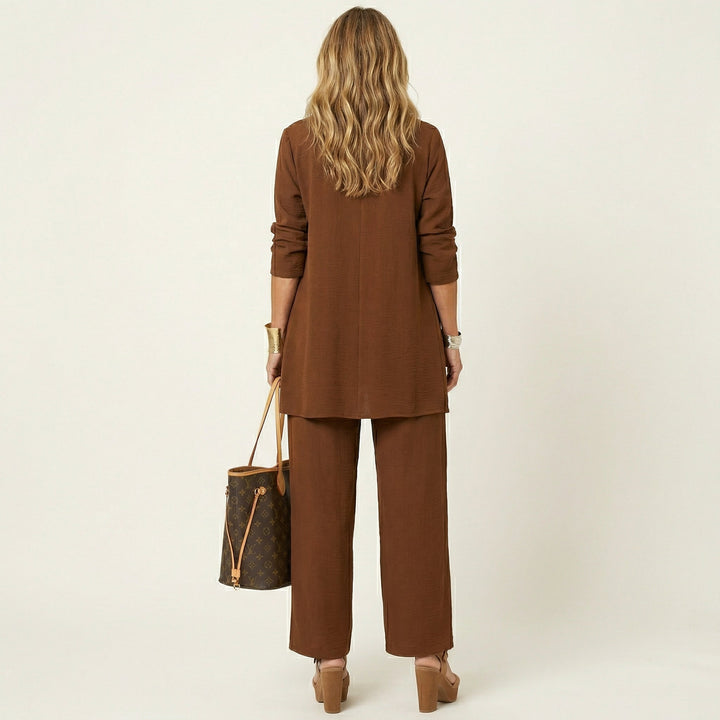 Women's minimalist 3-piece outfit featuring vest, blouse, and wide-leg pants set.