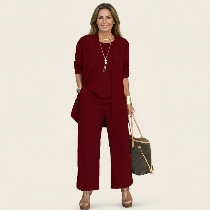 Chic women's 3-piece set for office or travel: vest, blouse, and comfortable wide-leg pants.