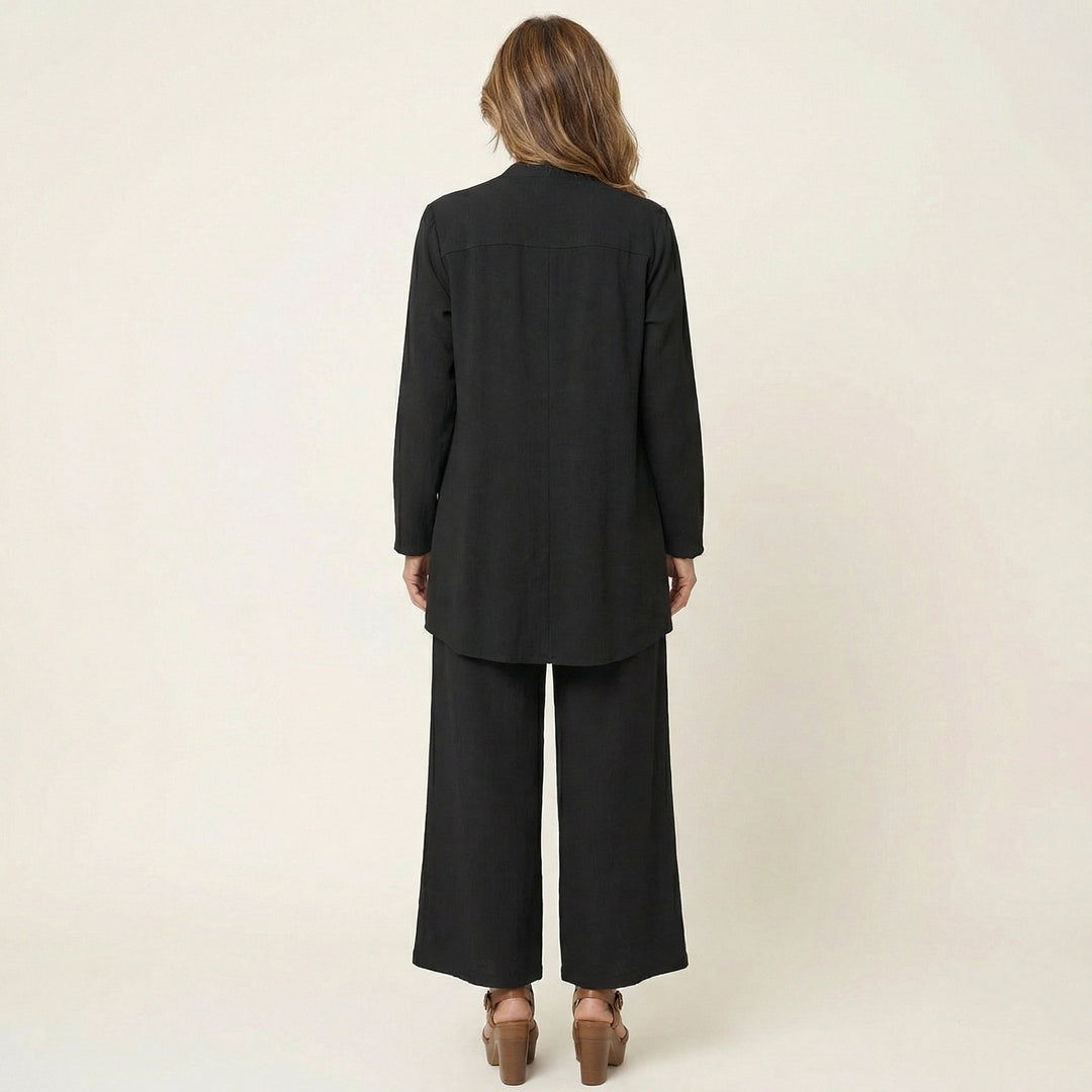 Chic women's 3-piece office fashion set with vest, blouse, and wide-leg trousers.