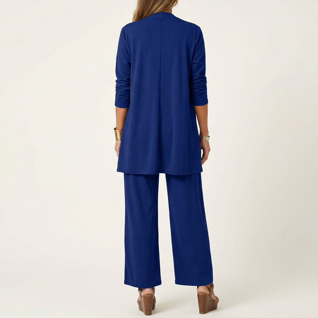 Elegant women's matching 3-piece ensemble: vest, blouse, and wide-leg pants.