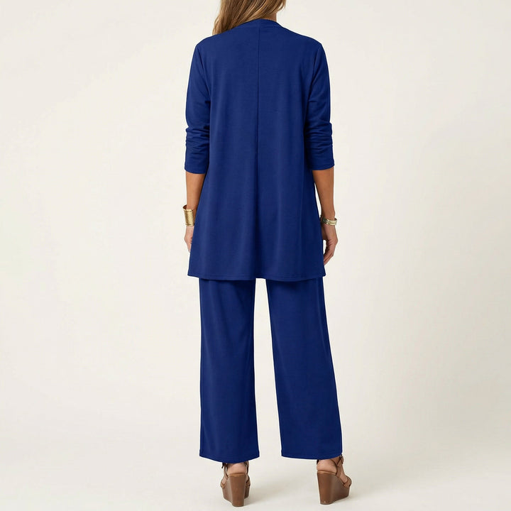 Elegant women's matching 3-piece ensemble: vest, blouse, and wide-leg pants.