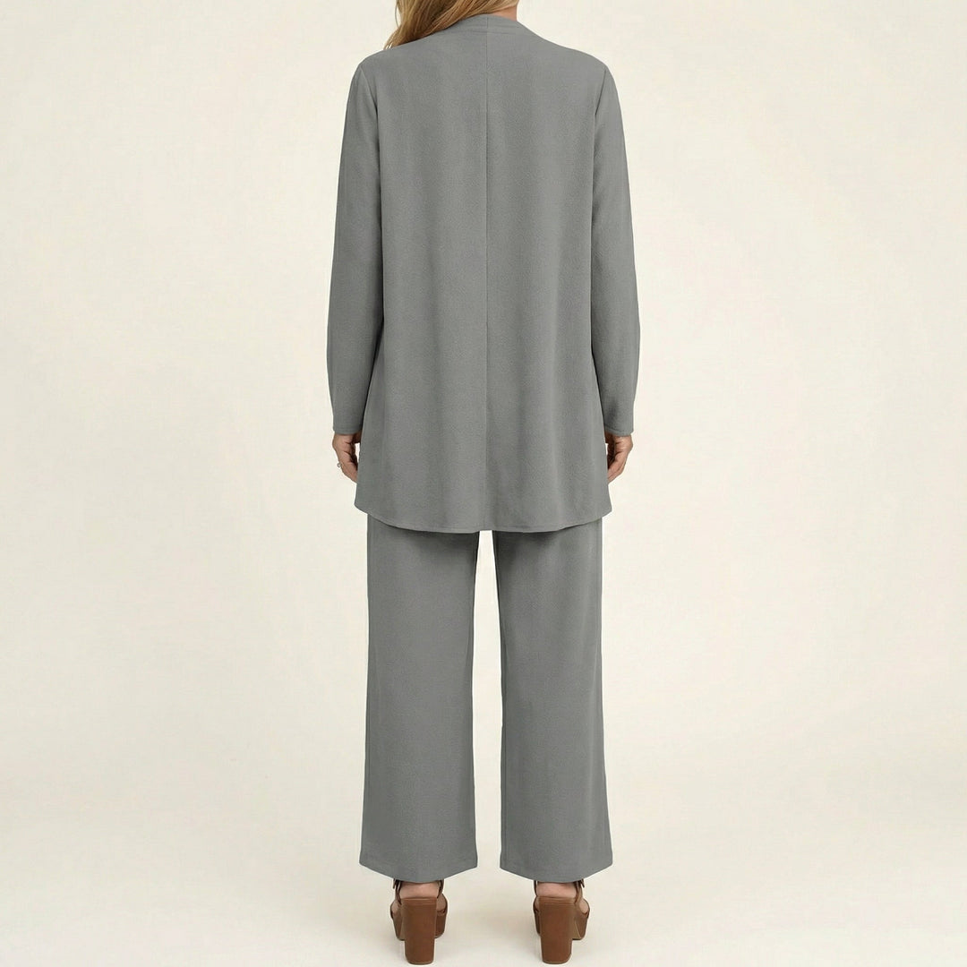 Women's elegant 3-piece set: a chic vest, blouse, and flowing wide-leg pants.