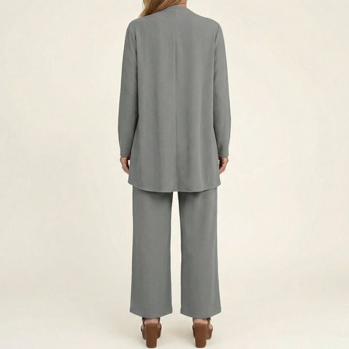 Women's elegant 3-piece set: a chic vest, blouse, and flowing wide-leg pants.