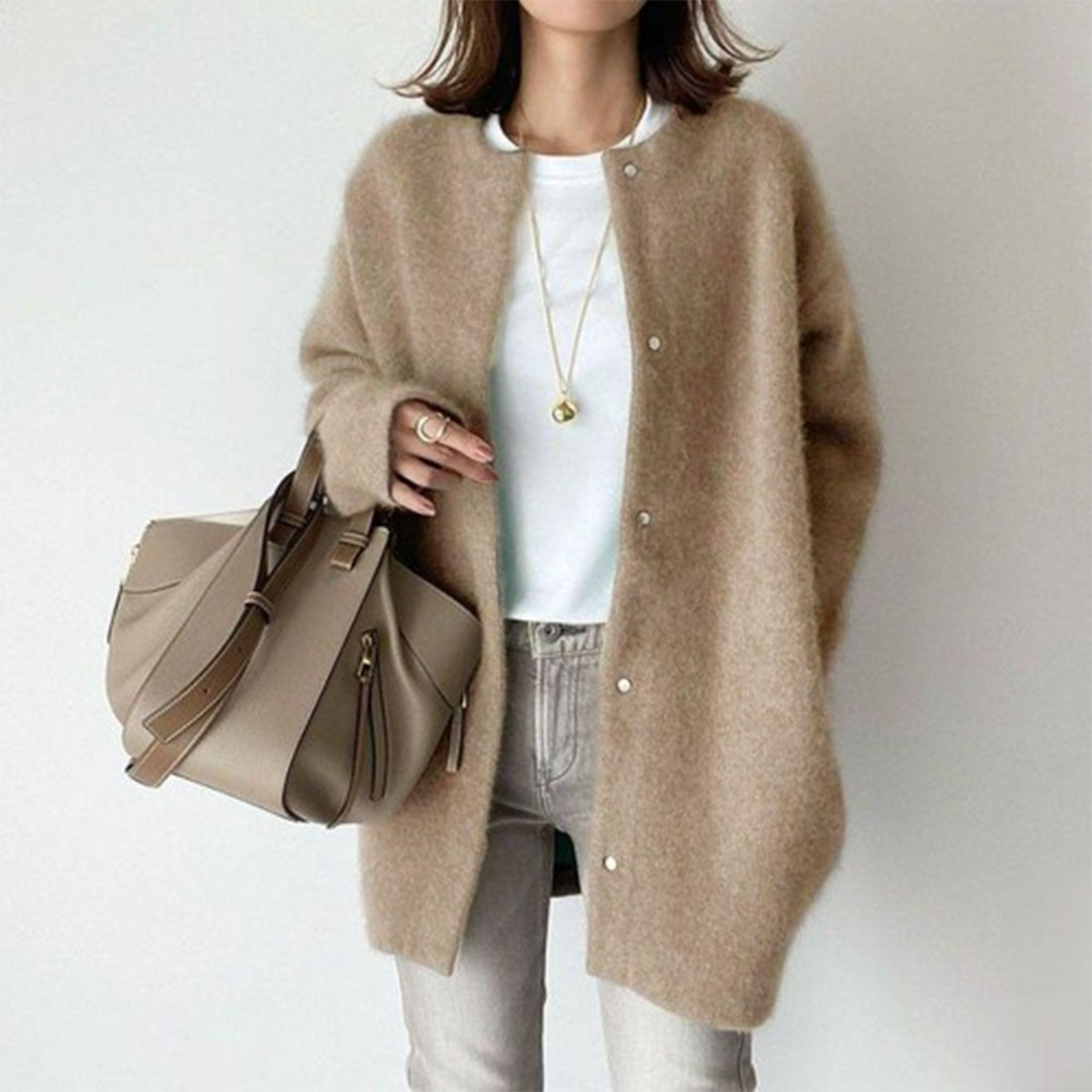 Stylish women's longline button cardigan, perfect for fall and spring fashion; oversized fit, everyday comfort.