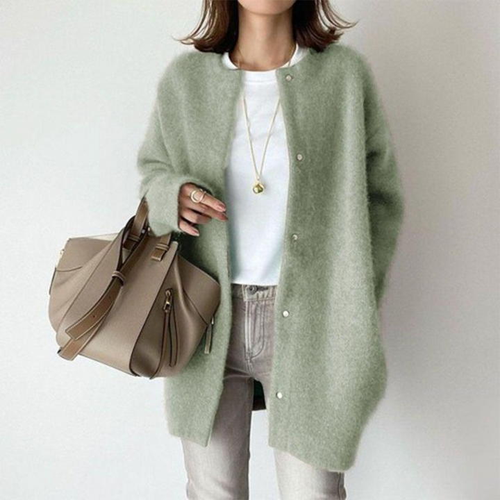 Casual chic women's longline cardigan featuring buttons, ideal for comfortable layering and everyday style.