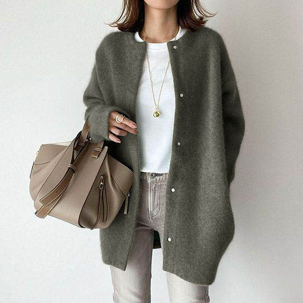 Timeless women's longline button cardigan for effortless style, a versatile layering piece for all seasons.