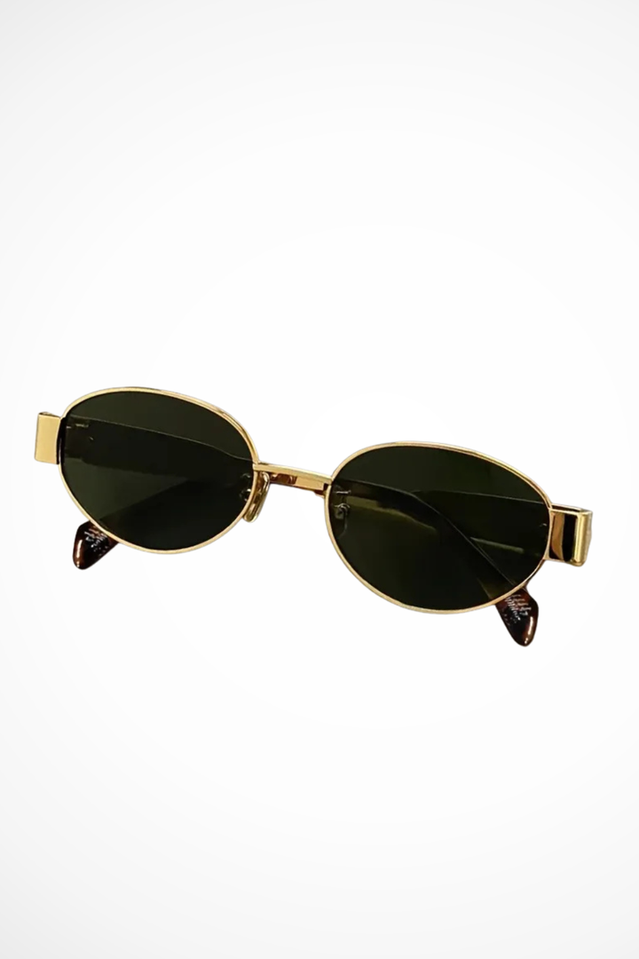 Elegant women's oval metal frame sunglasses. Minimalist design with dark lenses. Classic eyewear.