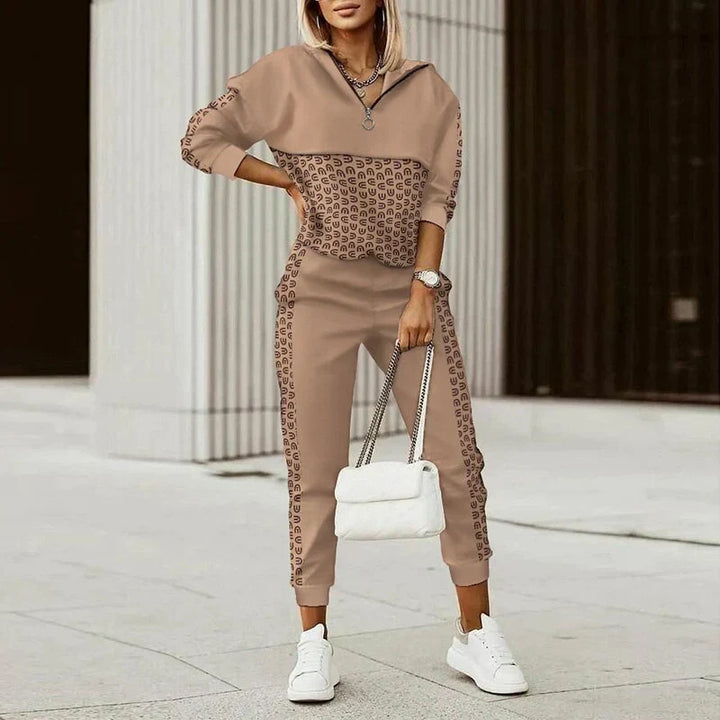 Women's modern casual tracksuit with a zipper top. Two-piece set, perfect for stylish comfort & loungewear.