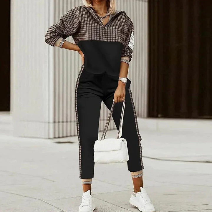 Comfortable women's loungewear tracksuit, a two-piece matching set with a stylish zipper top. Modern casual wear.