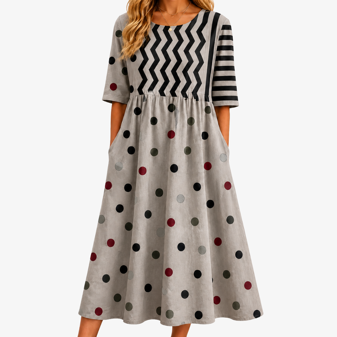 Women's Modern Charm mixed print midi dress with pockets. Perfect for summer, casual & elegant wear. Flowy style.