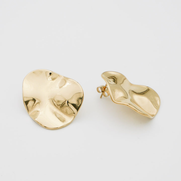 Silver plated women's stud earrings, featuring a contemporary geometric sculpted design.