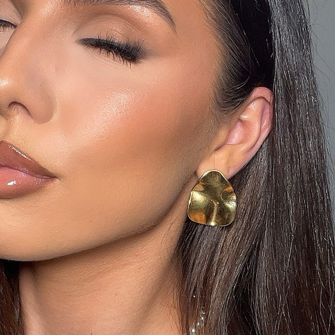 Elegant gold plated geometric stud earrings for women, a sophisticated modern jewelry choice.
