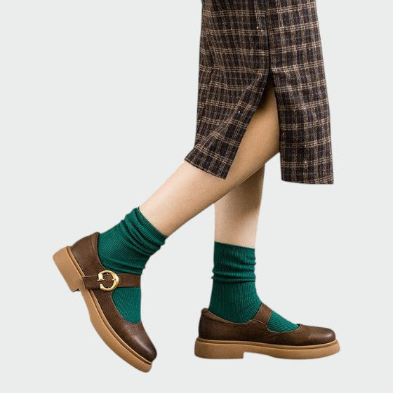 Versatile women's Mary Jane footwear, blending classic style with modern comfort and an adjustable strap.