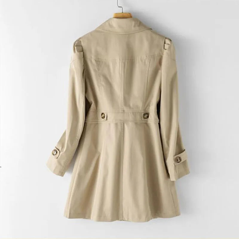Modern women's trench coat, open collar & button front. Stylish & lightweight outerwear, perfect for spring/autumn fashion.