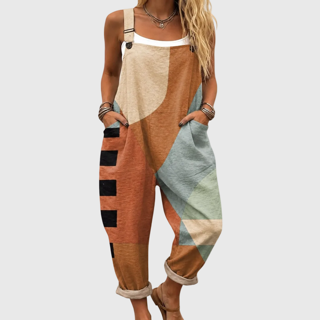 Women's modern patch jumpsuit with a relaxed fit, geometric pattern, and adjustable straps for stylish casual wear.