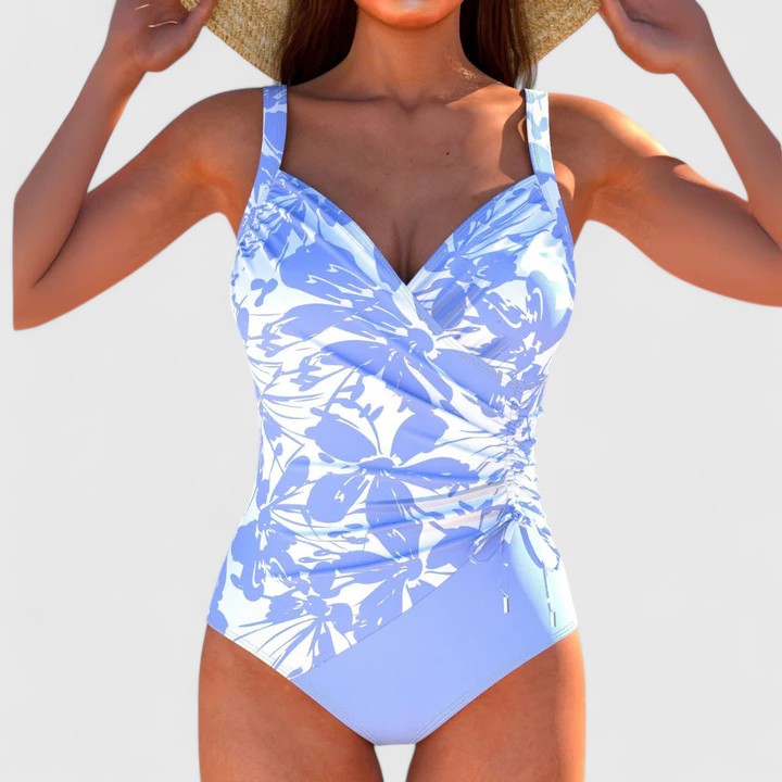 Stylish women's modern printed swimsuit, ideal beachwear & resort wear. Flattering one-piece for vacation.